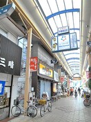 中崎商店街(ディスカウントショップ)まで442m クロワール　北梅田