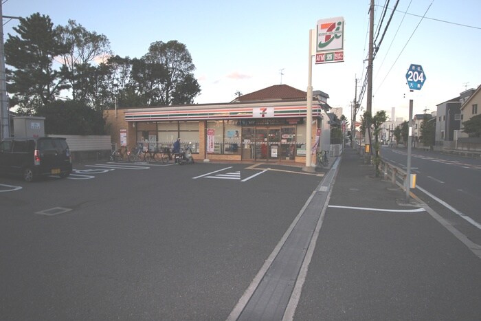 セブンイレブン(コンビニ)まで80m 岸和田パークハイツ