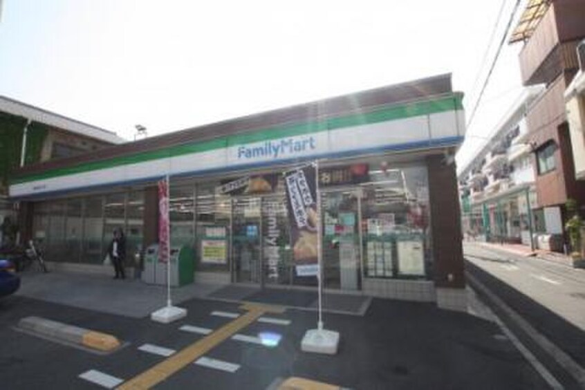 ファミリーマート都島本通3丁目店(コンビニ)まで350m 都島電化ハイツ