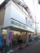 ローソンストア100　門真野里町店(コンビニ)まで310m Biscuss Foresta Ohwada