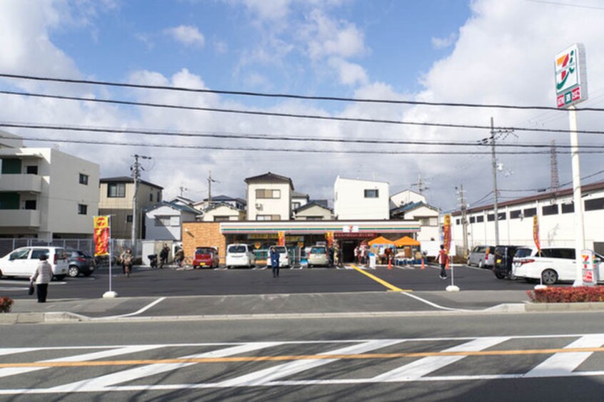 セブンイレブン枚方渚西２丁目店(コンビニ)まで799m 小倉町借家