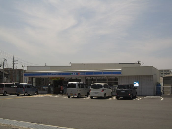 ローソン(コンビニ)まで1060m ラフィネＫＵＢＯ