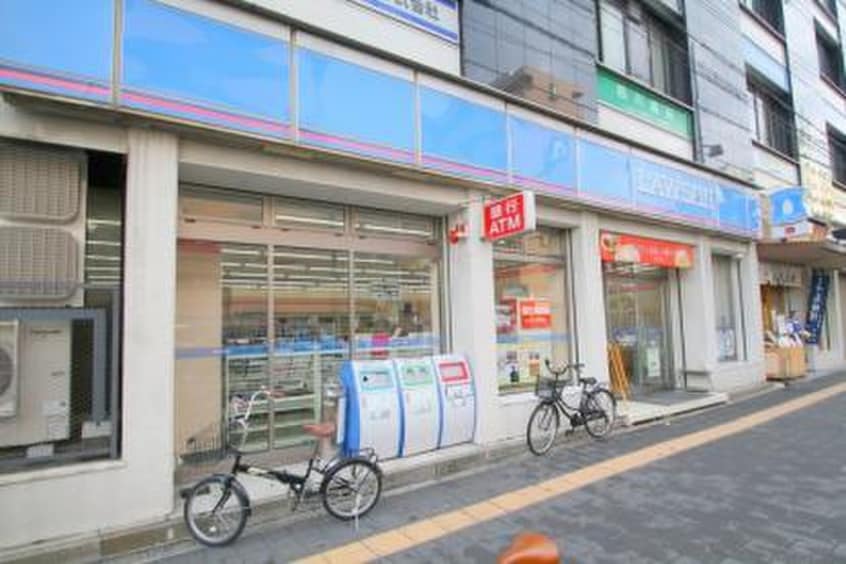 ﾛｰｿﾝ(スーパー)まで600m 村林マンション