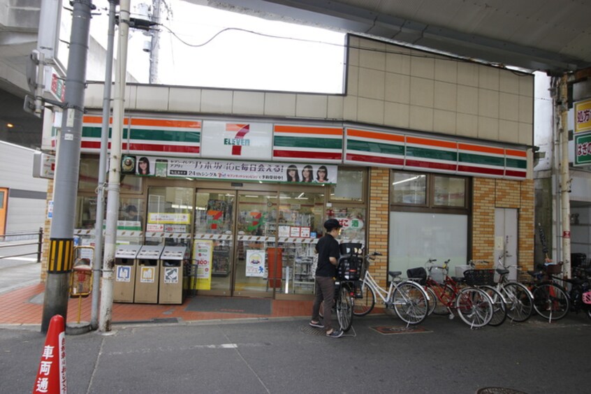 セブンイレブン岸里玉出駅前店(コンビニ)まで140m ベルテプラージュ