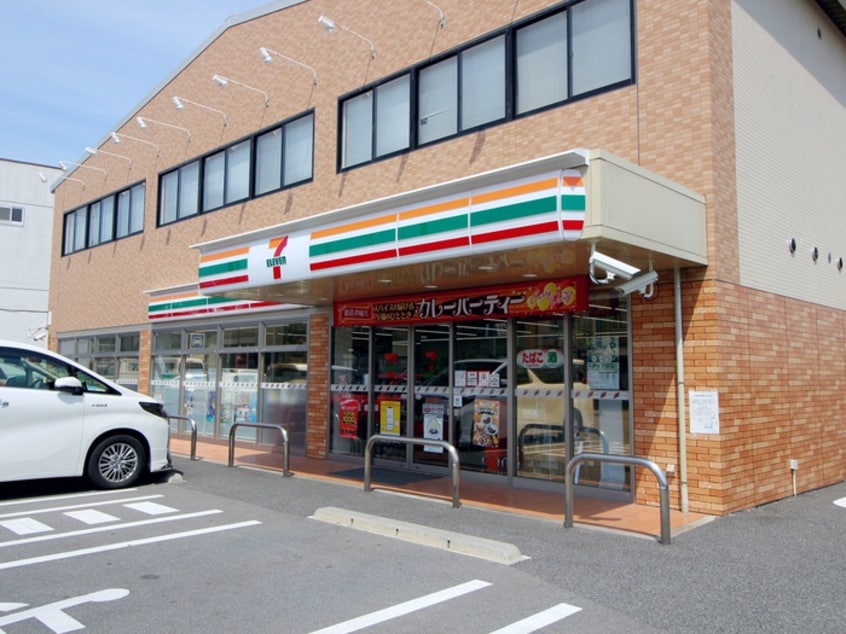 セブンイレブン(コンビニ)まで700m 箕面コウメイハイツ