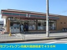 セブンイレブン高槻大冠店(コンビニ)まで450m ローレルガーデンⅡ