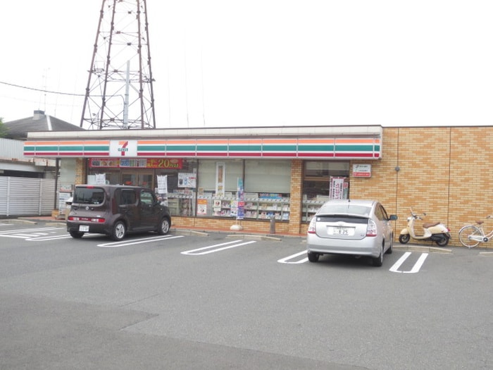 セブンイレブン(コンビニ)まで910m 東香里野村マンション