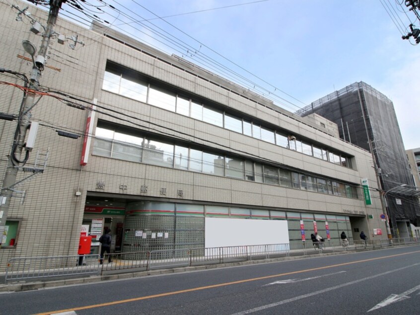 豊中郵便局(郵便局)まで188m 本町中島ビル