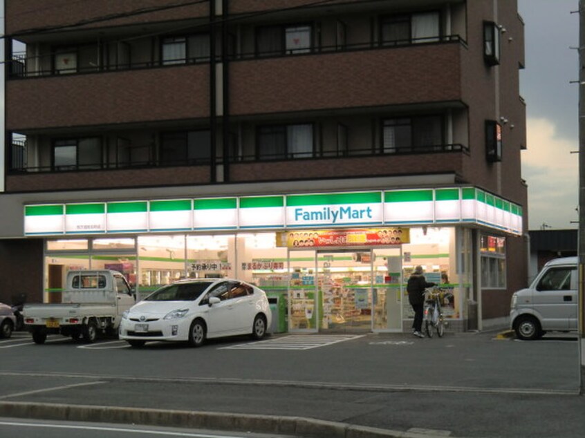 ファミリーマート枚方招提北町店(コンビニ)まで487m 奥田ハイツ