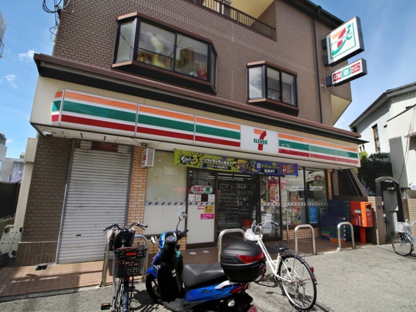セブンイレブン池田石橋１丁目店(コンビニ)まで65m エミーナヒルズ