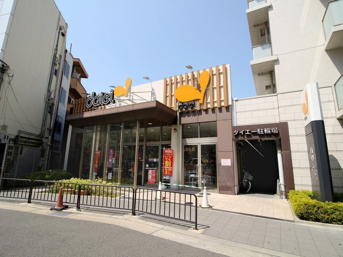 ダイエー豊中駅前店(スーパー)まで450m メゾンドール豊寿荘