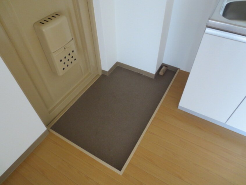 玄関 アルファ・マンション