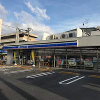 ローソン南吹田五丁目店(コンビニ)まで220m RIDGEガーデン江坂Ⅰ