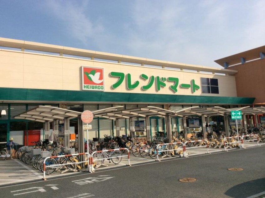 フレンドマート岸部店(スーパー)まで602m Flora正雀