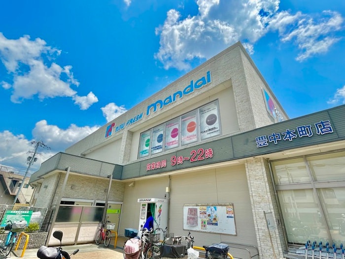 万代 豊中本町店sebunn(スーパー)まで142m トリニティ豊中本町