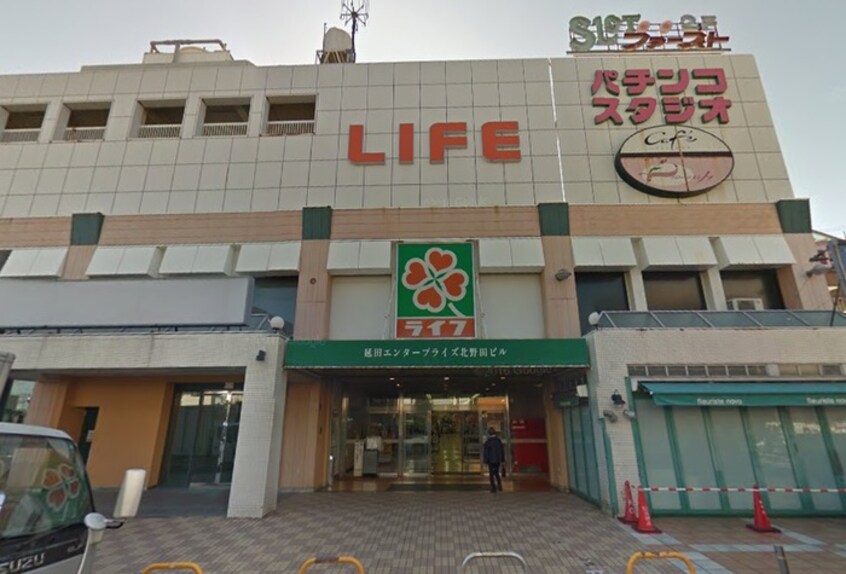 ライフ(スーパー)まで581m メゾンドール北野田