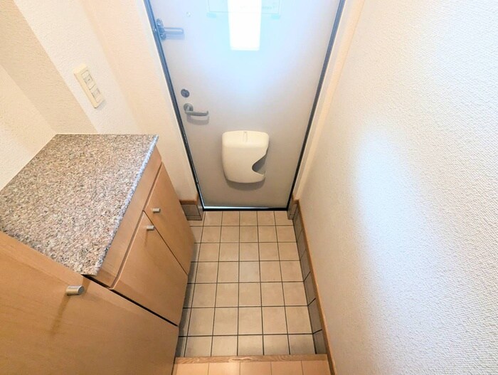 玄関 カ－サグラシオッソ