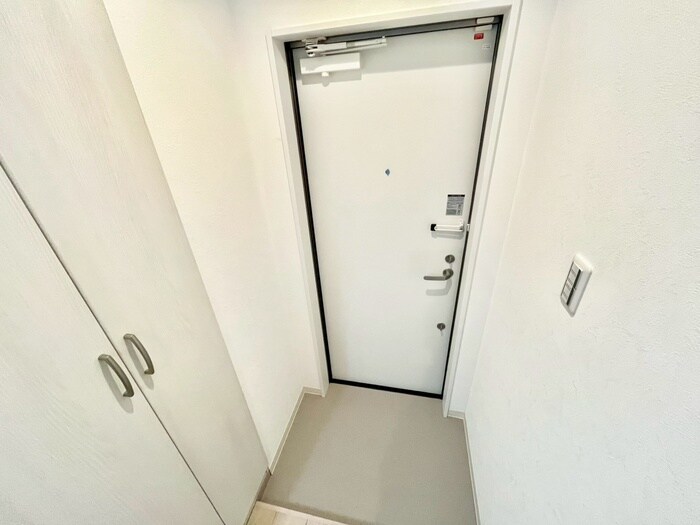 玄関 プルメリア阪大前