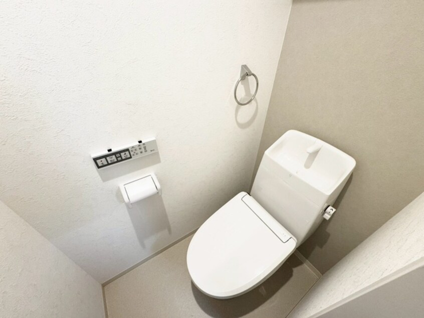 トイレ プルメリア阪大前