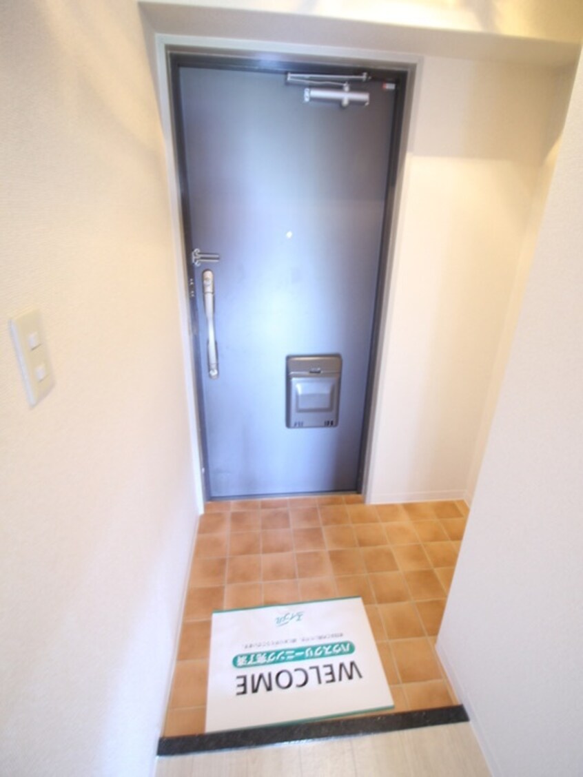 玄関 ﾒﾛﾃﾞｨ-ﾊｲﾑ枚方牧野公園(216)