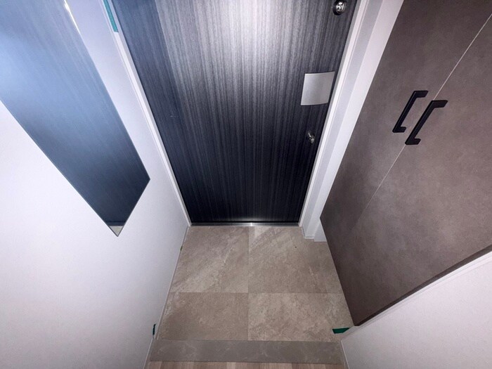 玄関 レジュールアッシュ神戸湊川公園