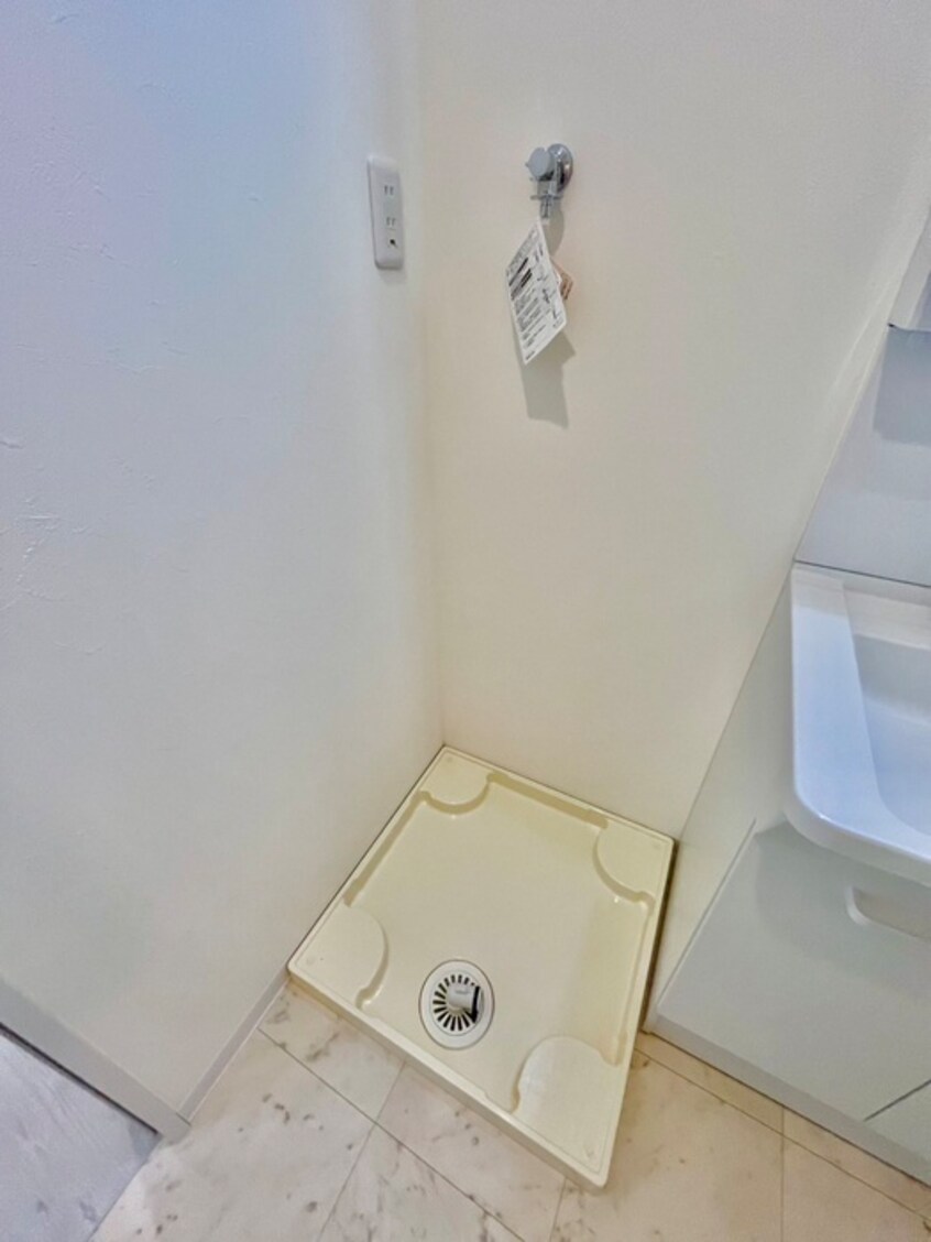 洗濯機置場 ソレイユ貝塚