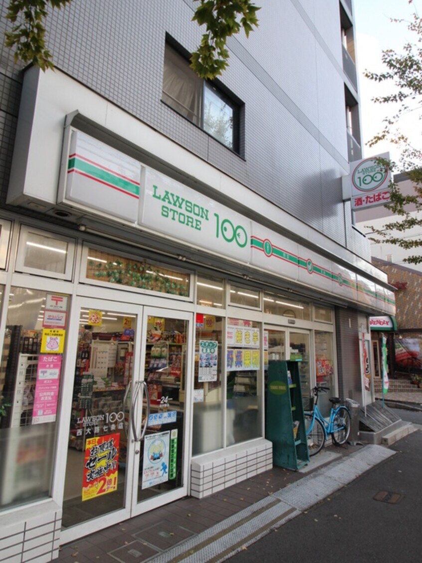 100円ローソン(コンビニ)まで180m セントポ－リア西大路七条
