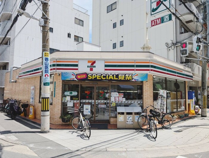 セブンイレブン(コンビニ)まで300m ｴｽﾘｰﾄﾞ弁天町NORTH RESIDENCE