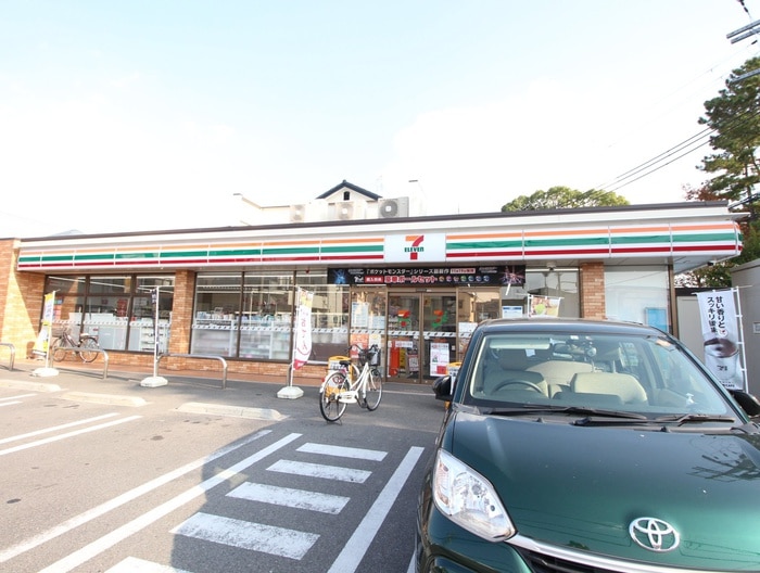 セブンイレブン八幡店(コンビニ)まで220m ジョイフルヨコタⅢ