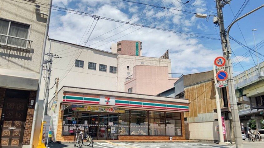 セブンイレブン(コンビニ)まで57m ﾌﾟﾚｻﾝｽ九条ｸﾞﾗﾝﾃﾞﾘｰｳﾞ(212)