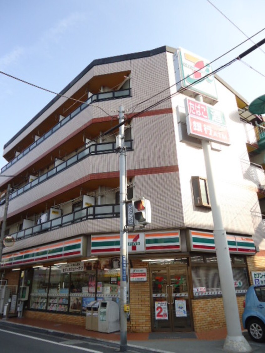 セブンイレブン 寝屋川萱島南店(コンビニ)まで956m パレスシロガキ