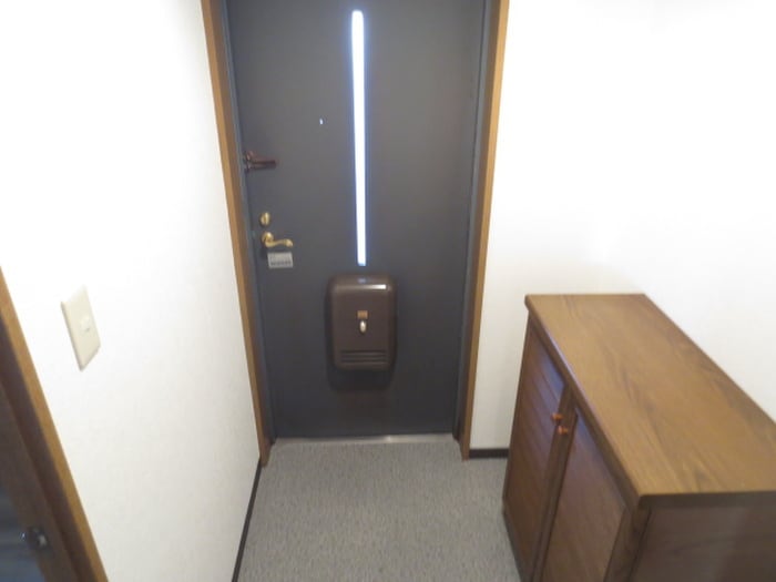 玄関 ノーメ・デラローザ