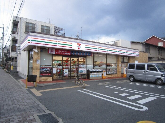 セブンイレブン田中西高原町(コンビニ)まで140m ロイヤルコーポタカハラ