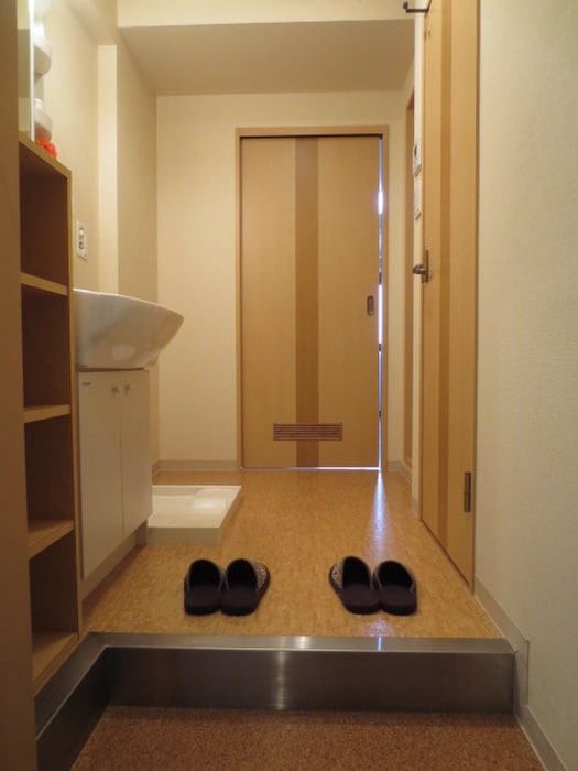 玄関 メタモルフォ－松西