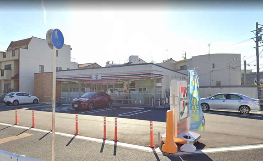 セブンイレブン十王店(コンビニ)まで450m ノアズ　アーク