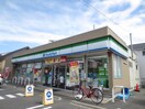 ファミリーマート北名古屋清水店(コンビニ)まで550m スプリングワン合田