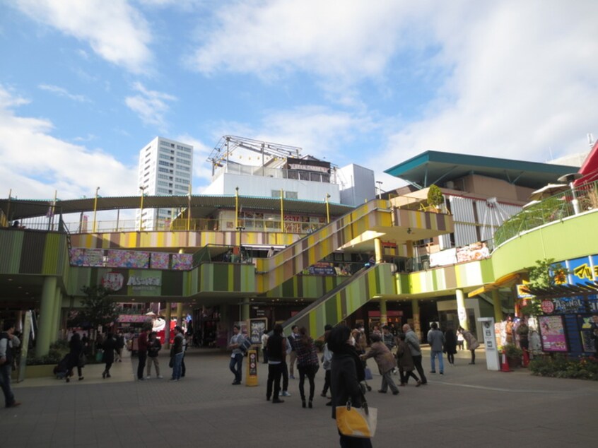 金山駅(ショッピングセンター/アウトレットモール)まで10m ニュ－コ－ポ沢上