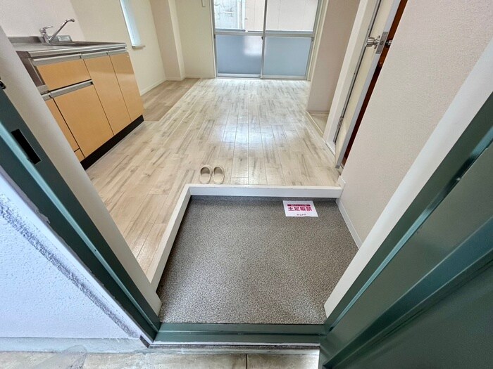 玄関 ロイヤルシティ天子田