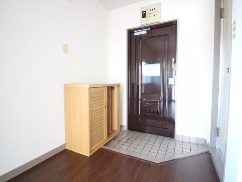 玄関 ロイヤルマンションヨコチ