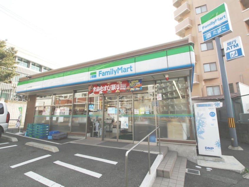 ファミリーマート北九大西店(コンビニ)まで120m ロイヤルパレス