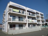 マル萬ビル前田