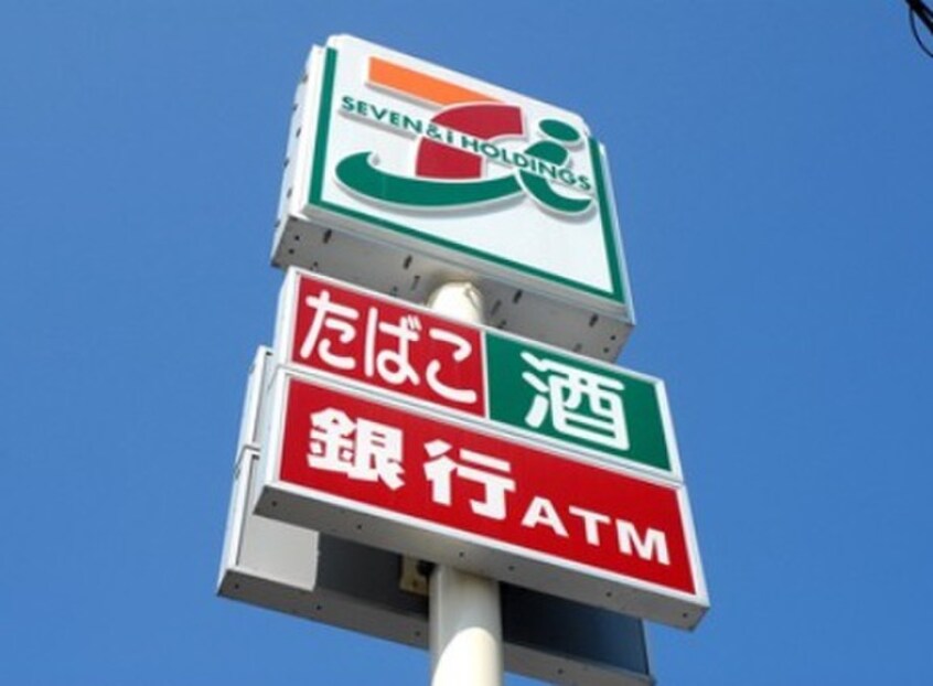 セブンイレブン岡垣吉木店(コンビニ)まで1280m ファミーユＭ Ｃ