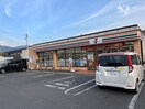 セブンイレブン直方王子団地前店(コンビニ)まで1300m ミニヨン・カ－サⅠ