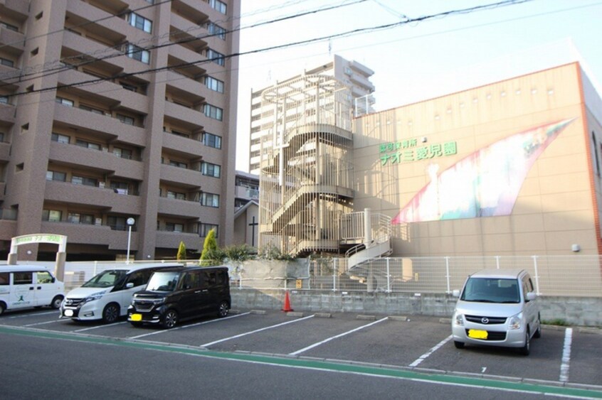 ナオミ愛児園(幼稚園/保育園)まで900m Calme crique戸畑駅西EAST棟