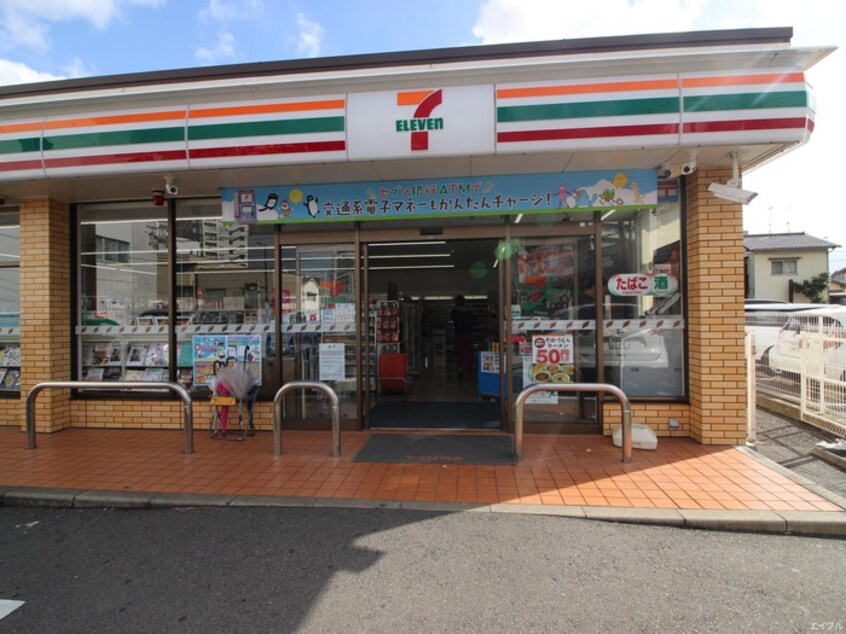 セブンイレブン吉塚店(コンビニ)まで80m ネストピア博多ガ－デン（702)