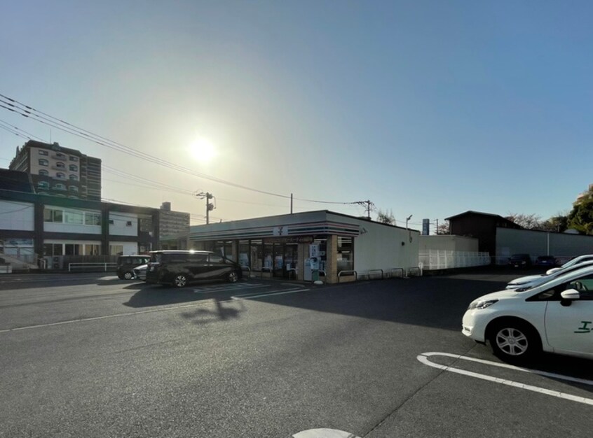 セブンイレブン　八幡友田店(コンビニ)まで400m プレステージ友田コンフォース