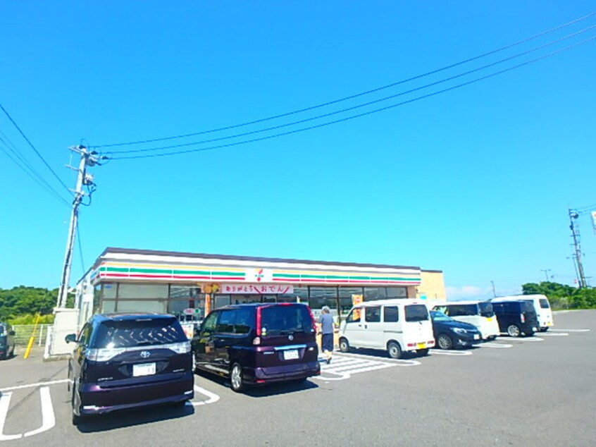 セブンイレブン芦屋山鹿店(コンビニ)まで571m リアルエステート Ａ