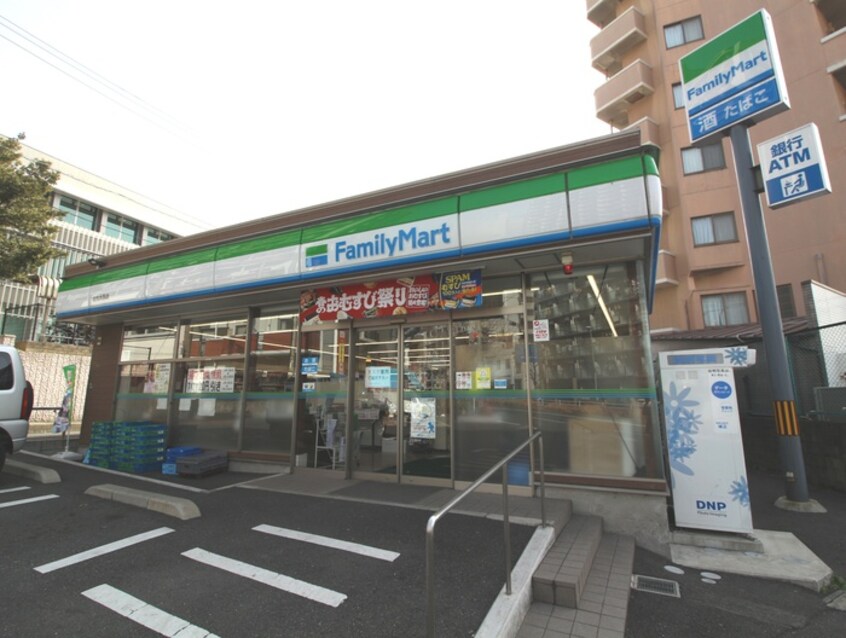 ファミリーマート北九大西店(コンビニ)まで260m メゾンゆみ