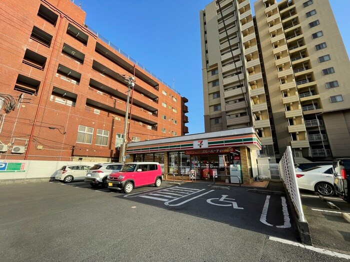 セブンイレブン光明店(コンビニ)まで250m オリエンタル折尾(202)