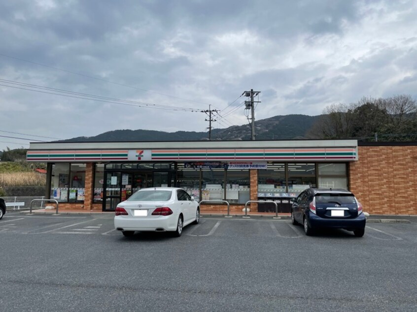 セブンイレブン田川添田店(コンビニ)まで1834m グランシャリオ　Ａ棟